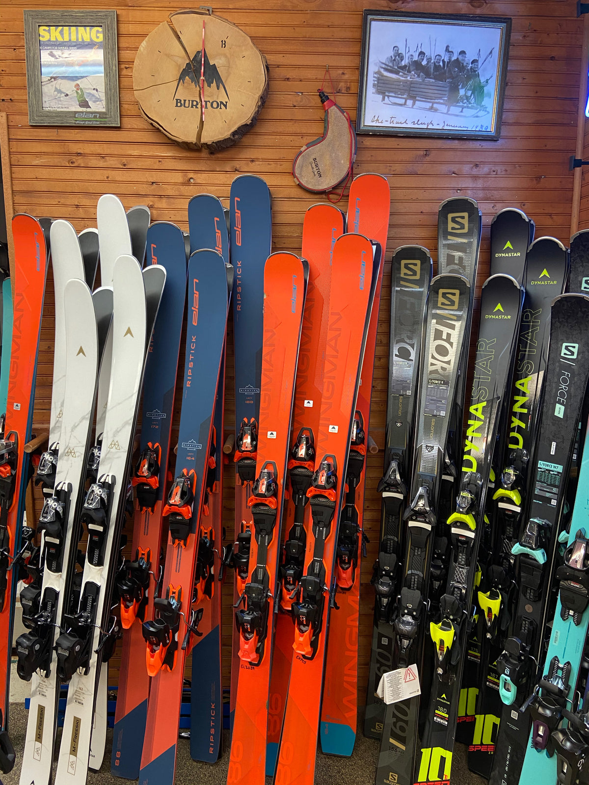 Wall of rental skis inside Mountainside Sports in Collingwood, near Blue Mountain